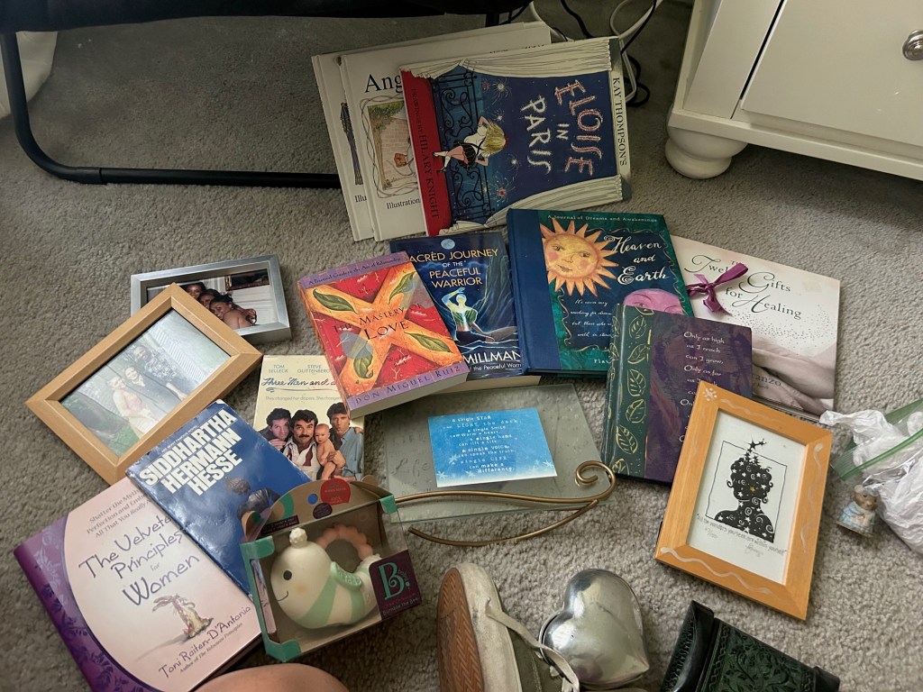 picture of books, room accents, memories from an old cupboard in my childhood bedroom at my parents' house