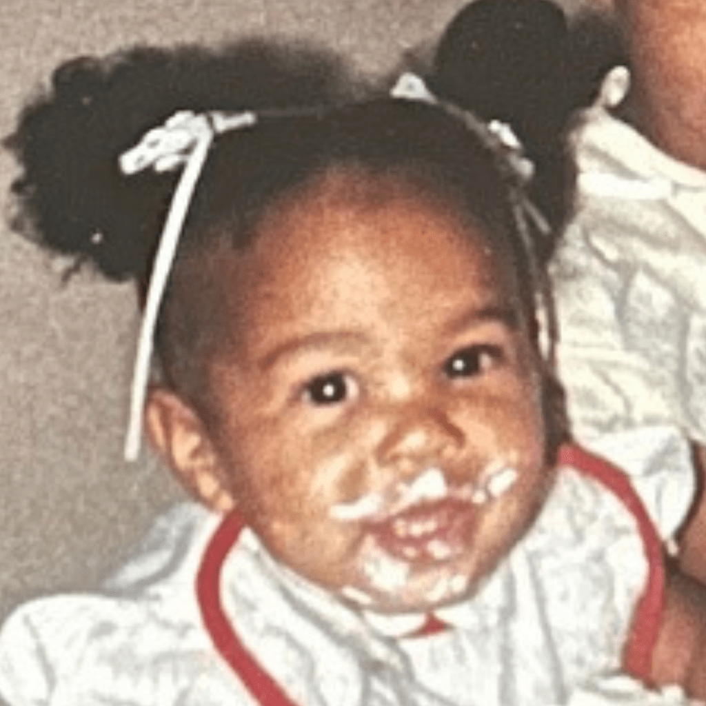 pic of chubby cheek me eating 1st bday cake